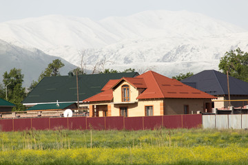 Fototapeta na wymiar mountains and houses from afar