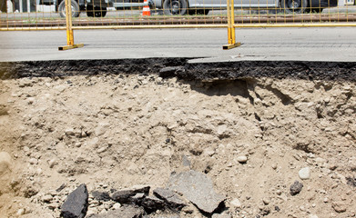 Repair of the damaged road - rupture of the pipeline, rupture of asphalt