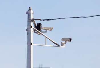 Obraz premium Surveillance cameras on the road for car speed