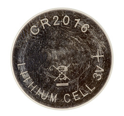 a cell battery close-up or a clock battery or a coin cell used to power small electronic devices such as a wristwatch or computer motherboard isolated on a white background