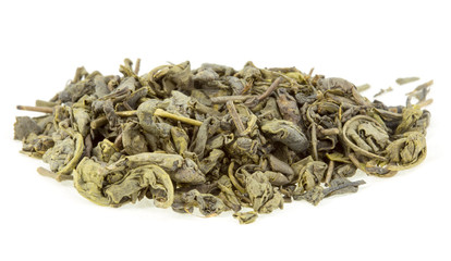 dry leaf green tea on a white background