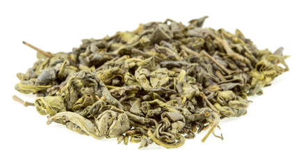 dry leaf green tea on a white background