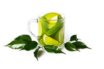Green Tea Leaves and Green Tea in Cup with Lime