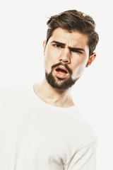 Fototapeta premium Portrait of surprised bearded man against white background