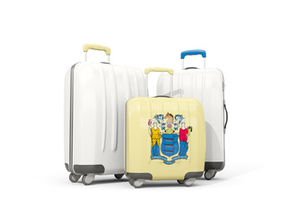 Luggage with flag of new jersey. Three bags with united states local flags