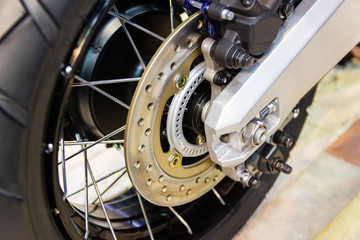 Fototapeta na wymiar close up - Detail Motorcycle brake disc is part of the motorcycle.