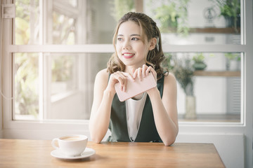 Beautiful Smiling Young Asian Woman. Portrait of cute girl with clean, fresh and perfect skin.
