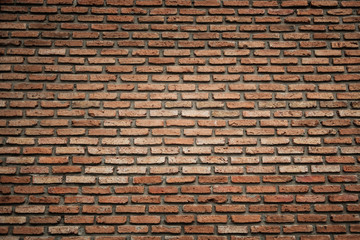 Red brick wall background or texture, vignette on corner