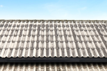 roof wavy tile, roofing tile old, white or grey roofing tile old on sky background