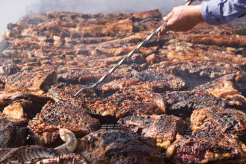 traditional meat grilled on the grill in the Argentine countryside