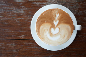 Hot Coffee on a Wood Table