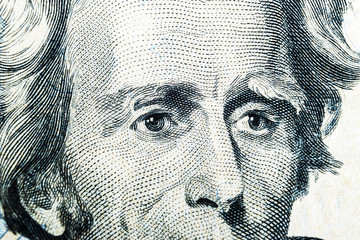 Close up view Portrait of Andrew Jackson on the one twenty dollar bill. Background of the money. 20 dollar bill with Andrew Jackson eyes macro shot. Money background. Face portrait