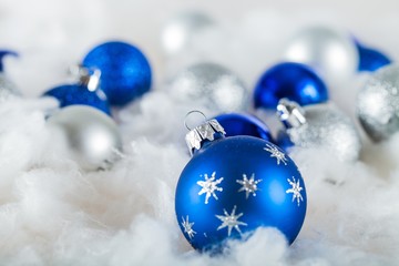 Blue and White Christmas Baubles on the Wadding