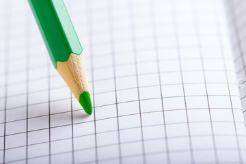 green pencil notebook close-up

