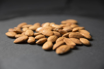 Almonds on Dark Background