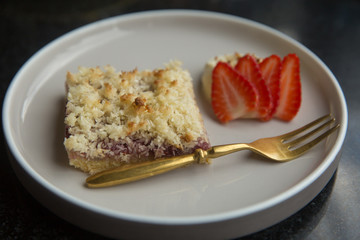 Delicious cheesecake with coconut on a plate. Breakfast and dessert