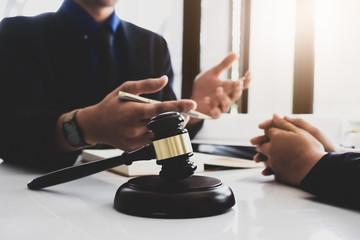 notary consultant concept , focus Judge gavel with client negotiation or discussion lawyer lawsuit bankruptcy of business her. Concepts of law.