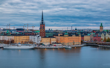 Fototapeta na wymiar Panoramic view onto Stockholm old town Gamla Stan and Riddarholmen church in Sweden