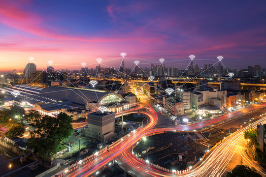 Wireless communication network in Big city concept. IoT(Internet of Things). ICT(Information Communication Technology).