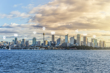 Technology and communication network in city concept. Technology and media icon over city.