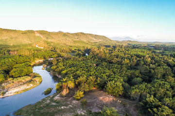 Aerial view of nature landscape green tropical forest with river