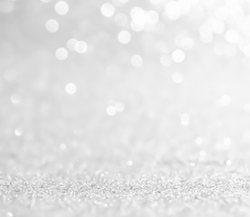 silver and white bokeh lights defocused. abstract background