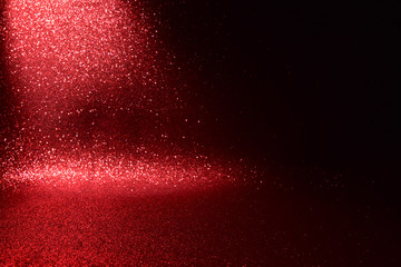 glitter vintage lights texture. red christmas abstract background. defocused