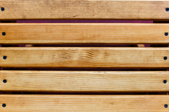 Wooden panel made of varnished planks. Horizontal texture