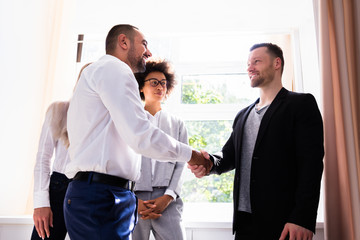 Businessman Shaking Hands With His Partner