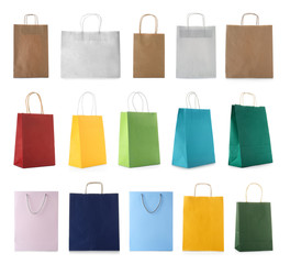 Set with shopping bags on white background