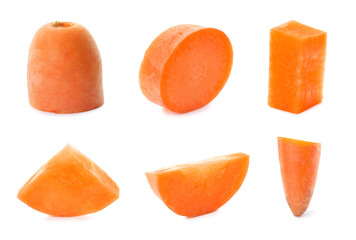 Set with ripe sliced carrot on white background