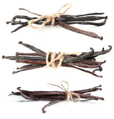 Set with vanilla pods on white background