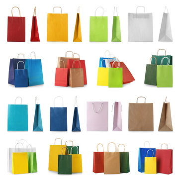 Set with shopping bags on white background