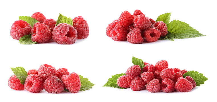 Set with ripe raspberries on white background