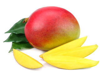 mango slice with green leaves isolated on white background. healthy food.
