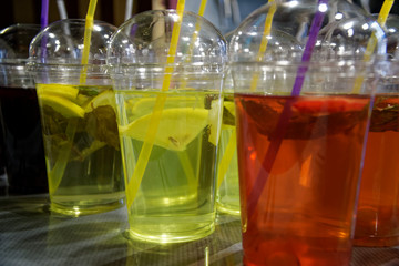 Beverage colorful drinks on the street market, chilled fruit drinks with ice in Asia.
