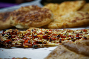 Street food on night outdoor market. Spicy, seafood, veggie, vegetable meal