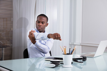 Businessman Relaxing In Office