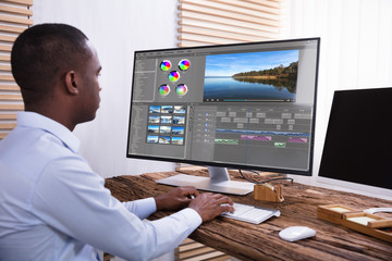 Businessman Editing The Video On Computer