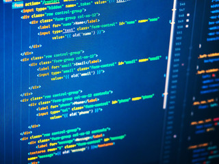 Lines of php code on the screen, close up.