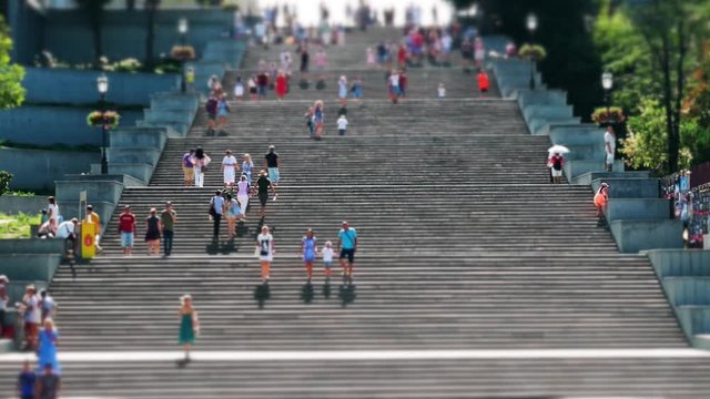 People Go Up The Stairs. Tilt-shift. Slow Mo