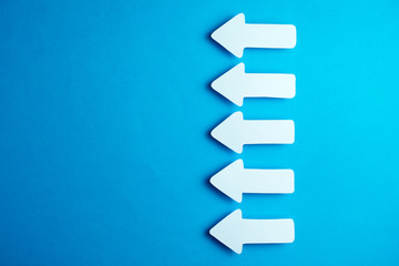 white arrows on a blue background. leadership purposefulness self-development concept