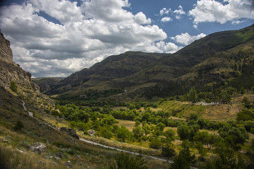 The mountains valley lighted by sun