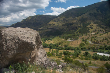 The mountains valley lighted by sun