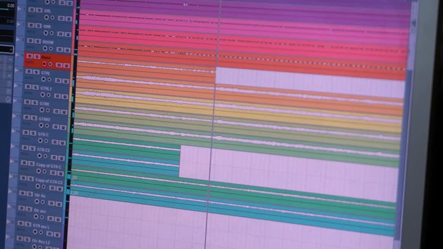 Recording studio, view of interface of the program for recording music, sound peaks during the recording of a song.