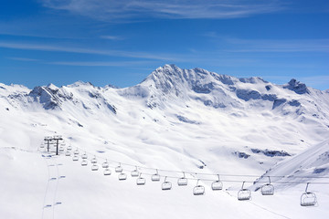 Landscape with ski lift in high mountains ski resort in winter, Tignes, France, Alps
