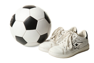Soccer ball and sneakers