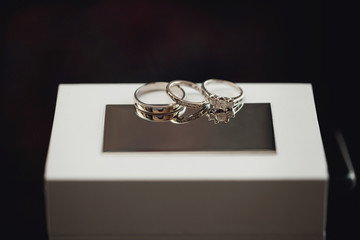 ewelry rings near jewelry boxes. wedding rings, Engagement rings,