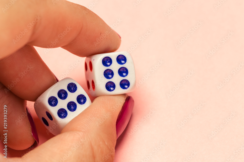 Wall mural hand with a pair of dice