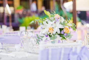 Beautiful fresh flowers table decoration in a restaurant for a special event